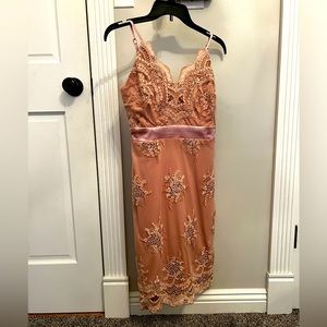 Super cute lace dress. Could be used to wear to wedding or homecoming.